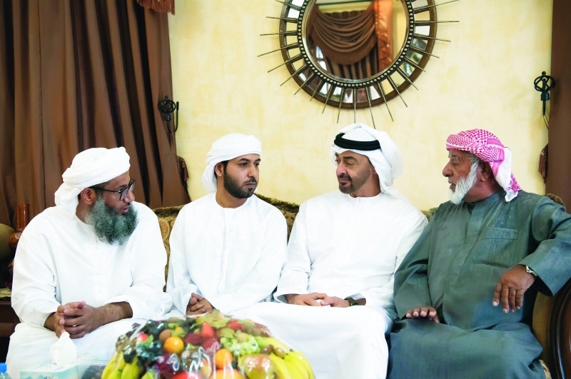 "محمد بن زايد لدى تقديمه واجب العزاء إلى أسرة الشهيد جمعة الكعبي"