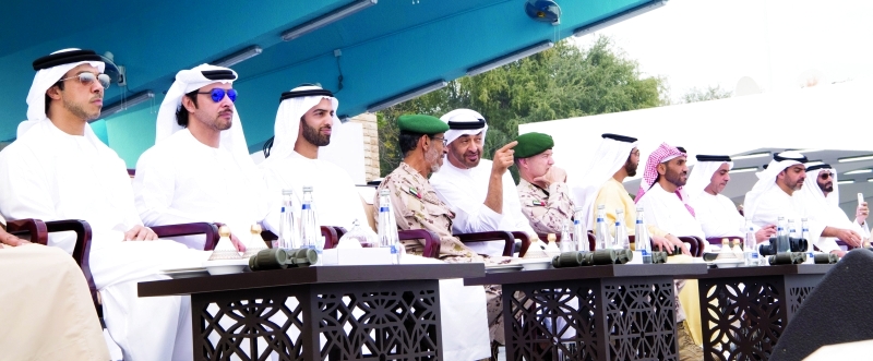 "■ محمد بن زايد يتابع العرض العسكري بحضور محمد بن سعود وحمدان ونهيان بن زايد وحمد الرميثي | وام"