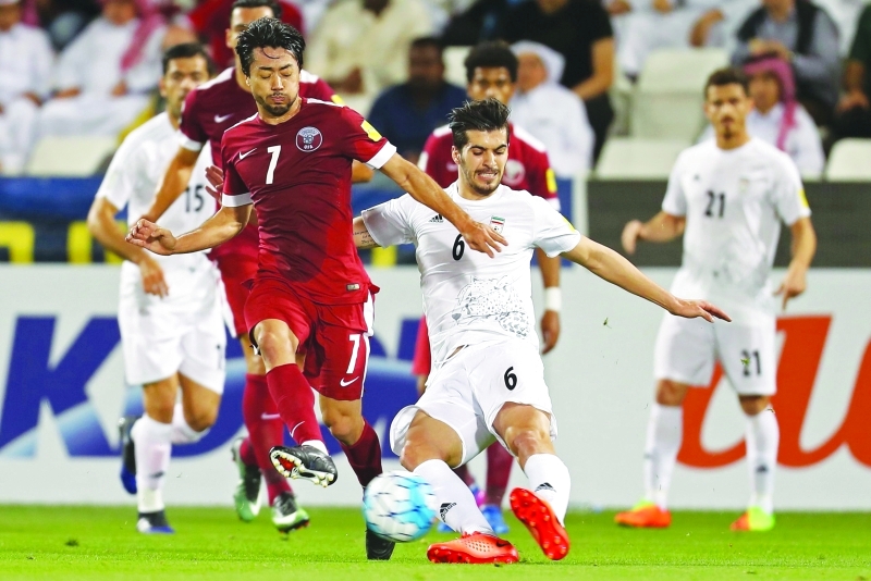"■ جانب من لقاء قطر وإيران | أ ف ب"