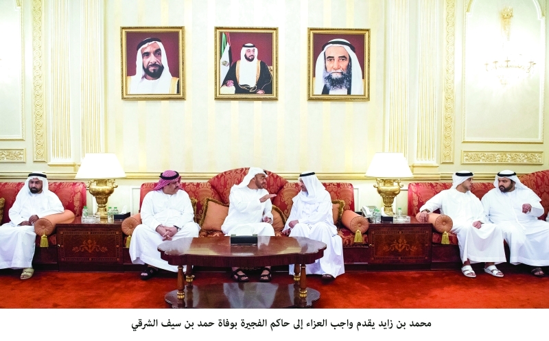 "محمد بن زايد خلال تقديم واجب العزاء لحمد الشرقي ومحمد بن حمد بحضور منصور بن زايد وحميد المعلا  |  وام"