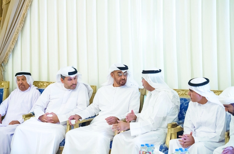 "■ محمد بن زايد خلال تقديم واجب العزاء بحضور خلدون المبارك"