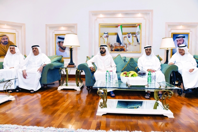 "■ محمد بن راشد خلال العزاء بحضور حميد المعلا وصقر غباش وأحمد الطاير"