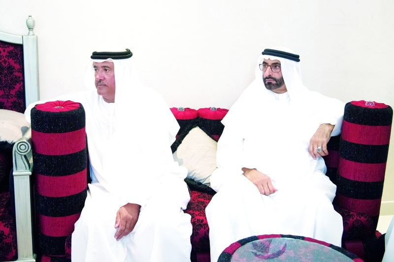 "■ سلطان بن حمدان ومحمد البواردي أثناء العزاء في الشهيد الحمادي"