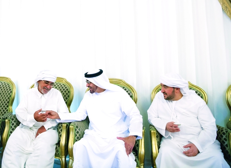 "■ محمد بن زايد أثناء تقديم واجب العزاء في الشهيد حسن البشر"