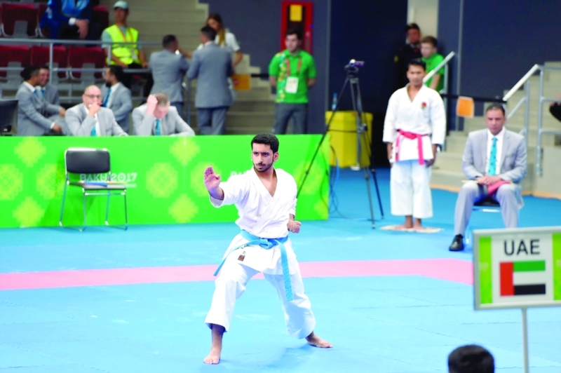 "■ العبار خلال المشاركة في منافسات الكاتا  |  تصوير- مصطفى الأميري"