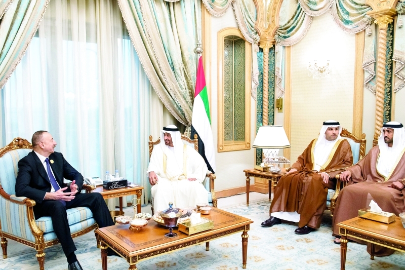 "■ محمد بن زايد مستقبلاً إلهام علييف بحضور خلدون المبارك ومحمد المزروعي"
