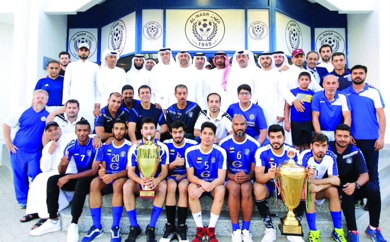"■ أسرة إدارة النصر مع لاعبي النادي أبطال الكأس الغالية | تصوير عاطف الغمري"