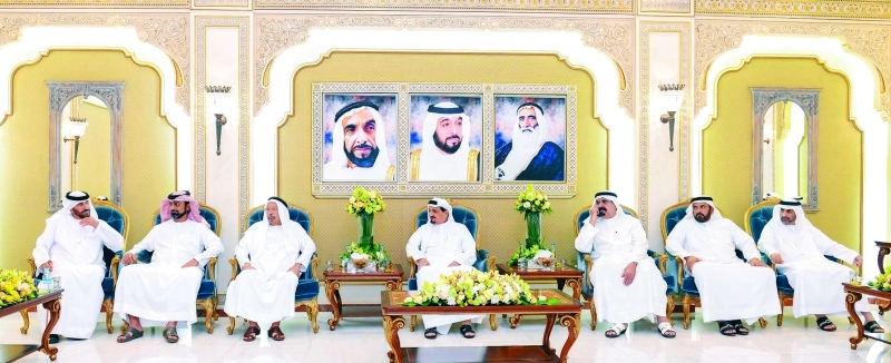 "حميد النعيمي خلال استقباله راشد عبد الله بحضور عمار بن حميد | وام"