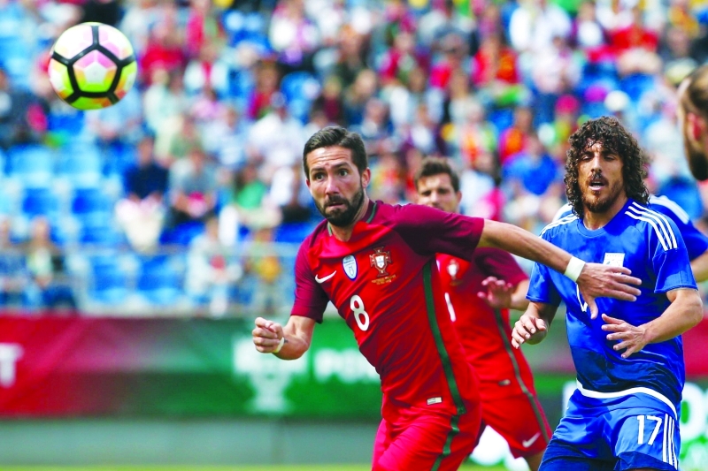 "■ من لقاء البرتغال وقبرص الودي | أ ف ب"