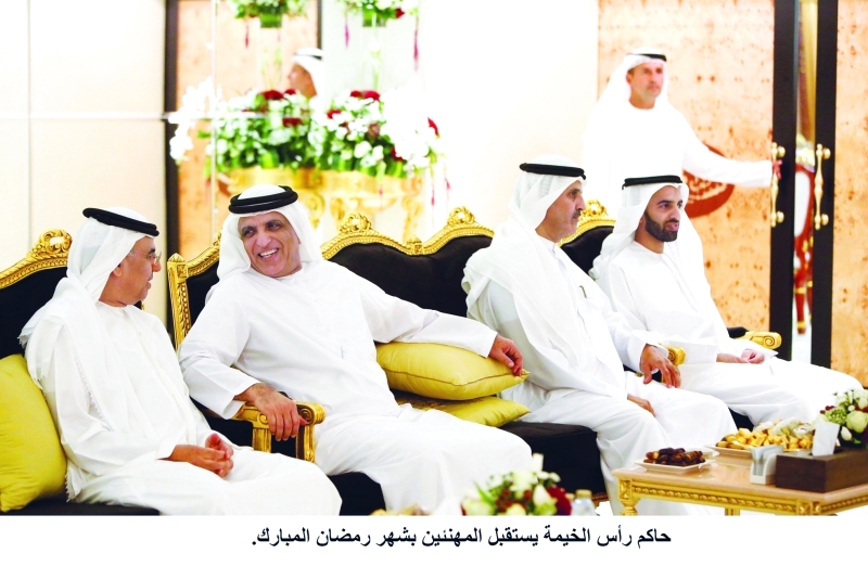 "■ سعود القاسمي ومحمد بن سعود لدى استقبال عبيد الطاير"