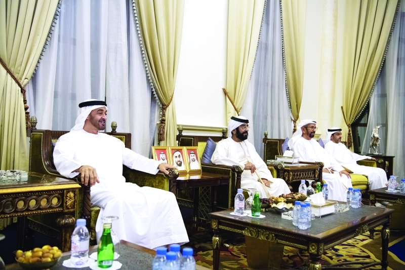 "محمد بن زايد وطحنون بن محمد وحامد بن زايد"