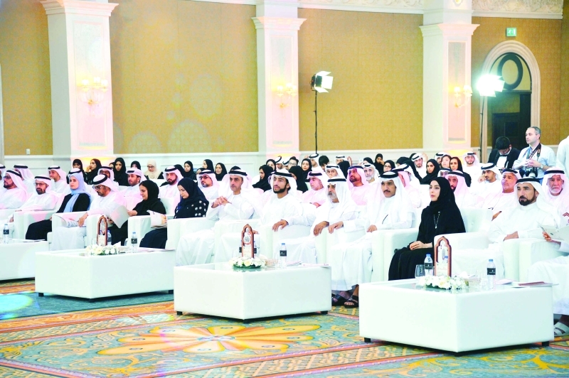 "■ سيف بن زايد خلال الحفل بحضور أمل القبيسي وعبدالله الشرقي ونهيان بن مبارك والوزراء والمسؤولين | من المصدر"