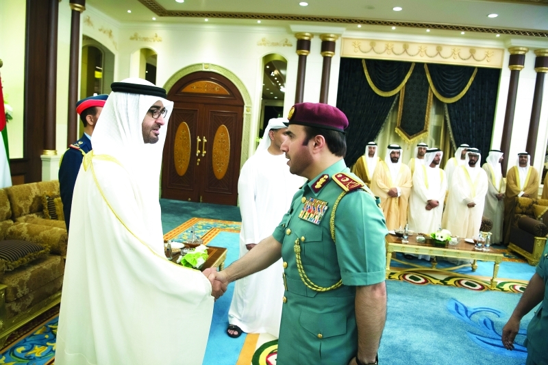 ".. ومصافحاً أحمد الريسي"