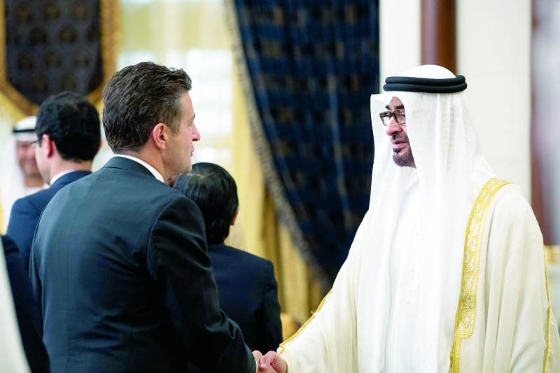 "محمد بن زايد مصافحاً المهنئين"