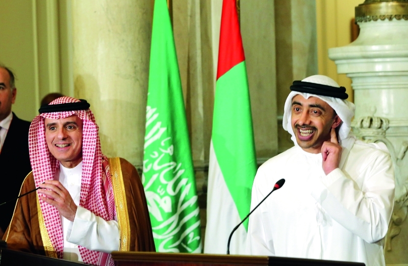 "■ عبد الله بن زايد وعادل الجبير خلال المؤتمر الصحافي  |  رويترز"