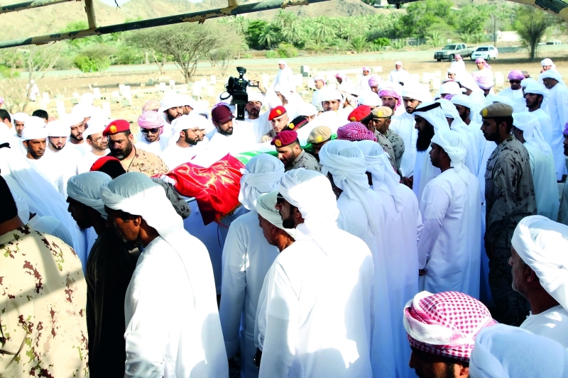 "■ أثناء مواراة الشهيد الثرى"