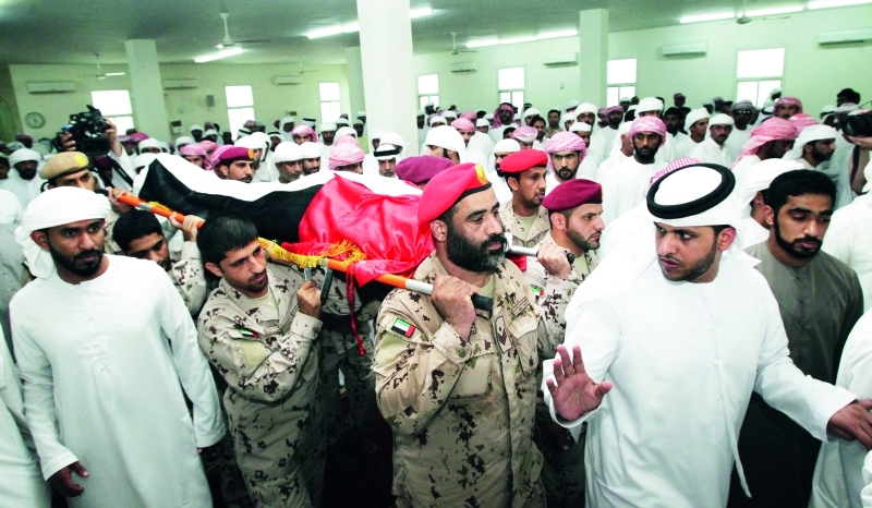 "■ .. خلال تشييع الشهيد إلى مثواه الأخير"