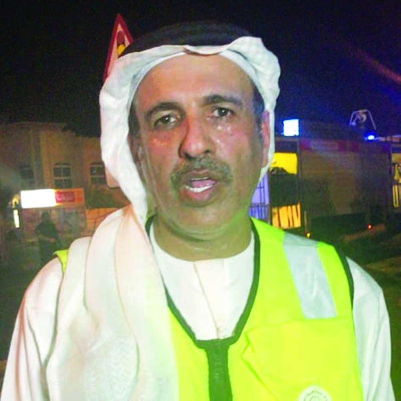 "راشد المطروشي متحدثاً من موقع الحريق"
