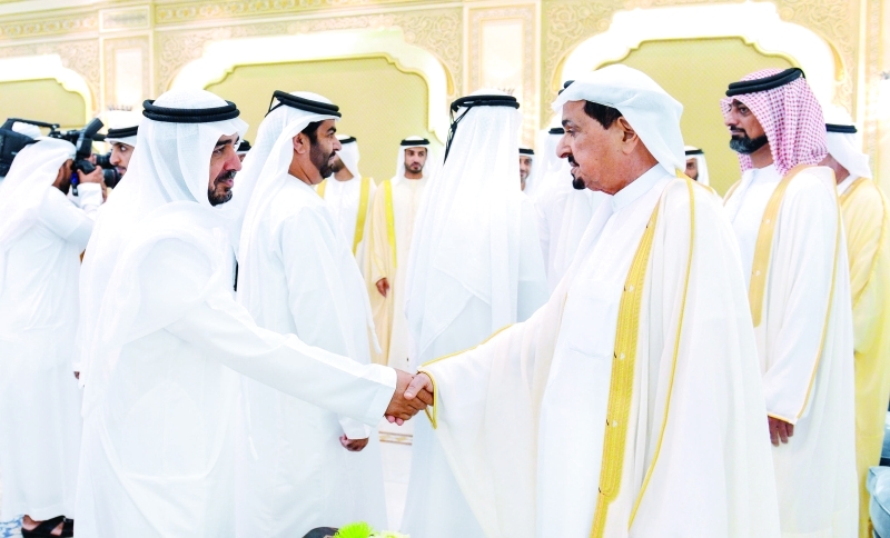 "■ حميد النعيمي مستقبلاً المهنئين بحضور عمار النعيمي"