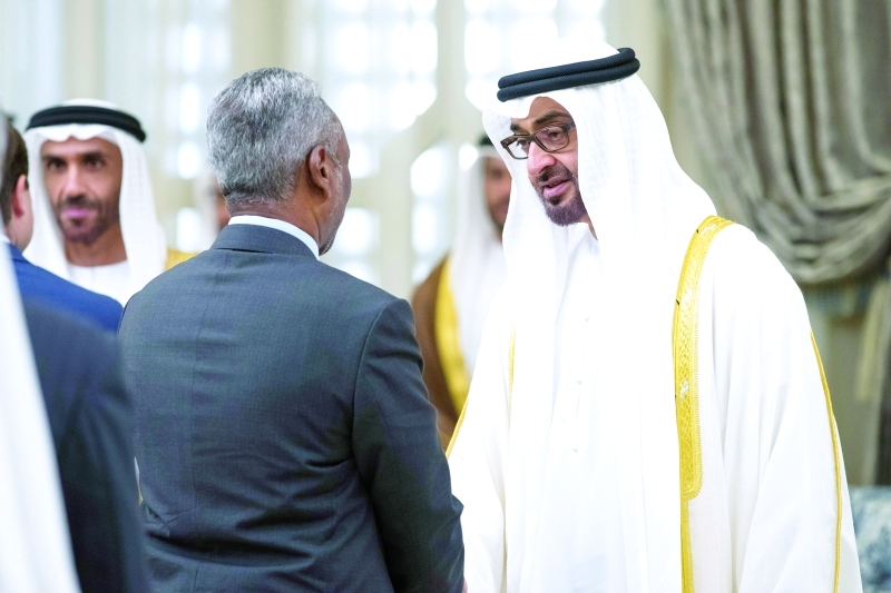 "محمد بن زايد لدى تقبّل التهاني بحضور نهيان بن زايد"