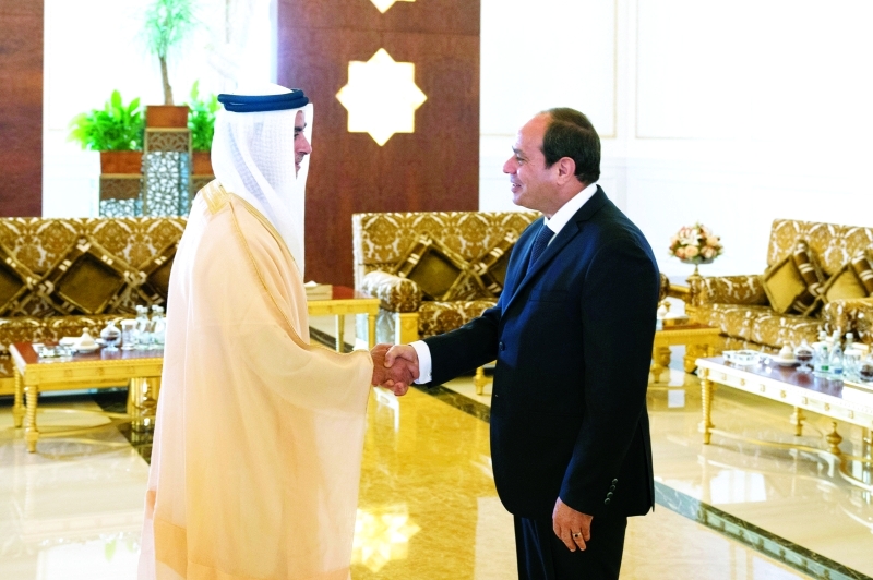 "■ السيسي مصافحاً سيف بن زايد"