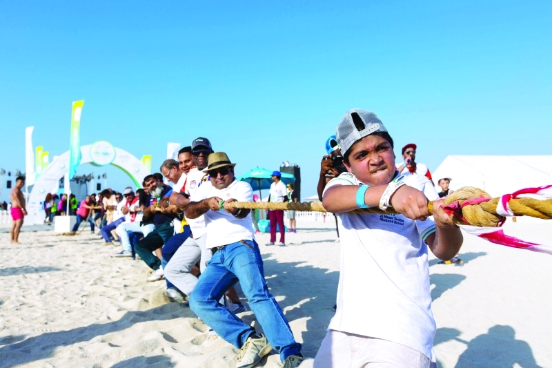"Tug-of-war at Kite Beach Weekend Carnival"
