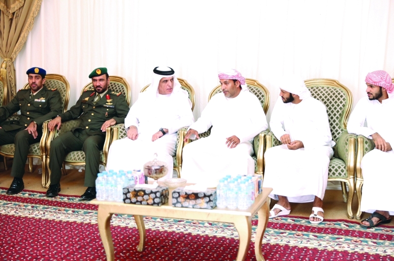 "■ حاكم رأس الخيمة خلال تقديم واجب العزاء لذوي الشهيد | وام"