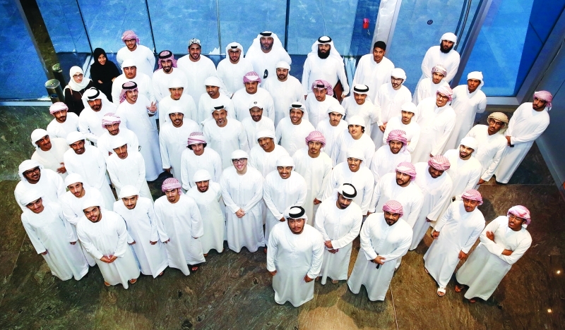 "■ المتطوعون في لقطة تذكارية | البيان"