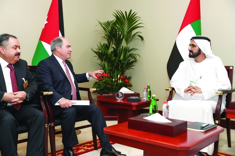 "■ محمد بن راشد خلال استقباله هاني الملقي"