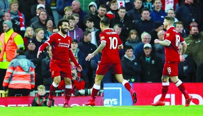 "■ محمد صلاح يحتفل بعد كسره لرقم فاولر القياسي | رويترز"