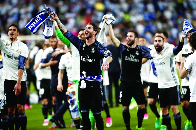"MALAGA, SPAIN - MAY 21: Players of Real Madrid celebrates their championship after the La Liga final match between Malaga and Real Madrid at La Rosaleda Stadium on May 21, 2017 in Malaga, Spain. (Photo by Burak Akbulut/Anadolu Agency/Getty Images)"