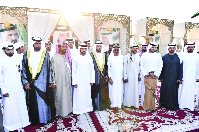 "Ⅶ حمدان ومكتوم بن محمد خلال حضورهما حفل الزفاف"