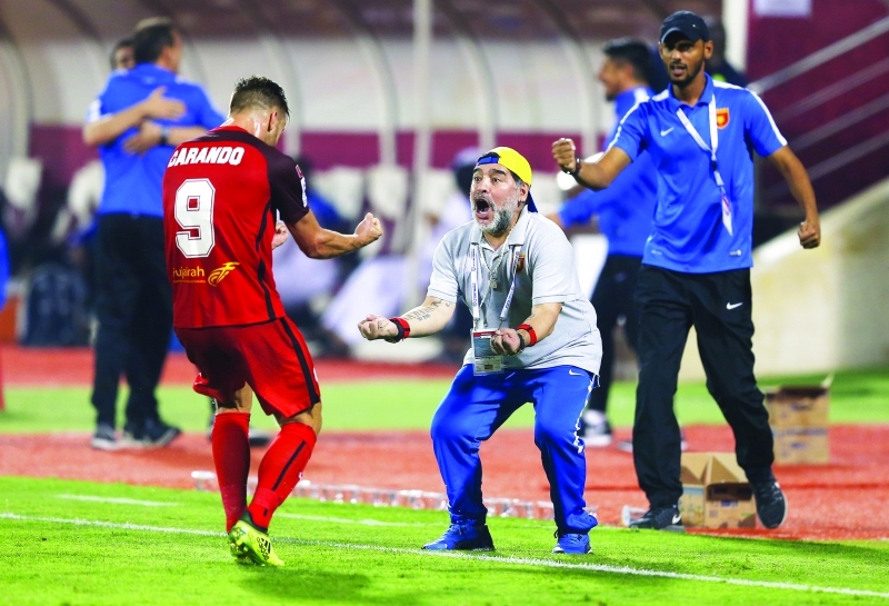 "مارادونا يحتفل بهدفي الأرجنتيني دانيلو | تصوير : زيشان أحمد"
