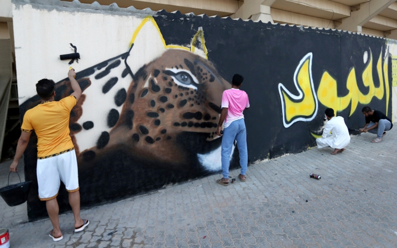 "جمهور الوصل رسم لوحة جدارية في استاد زعبيل | تصوير: سالم خميس"