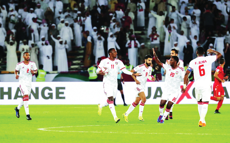 "United Arab Emirates' forward Ahmed Khalil (2nd-L) celebrates after scoring a goal during the 2019 AFC Asian Cup football game between United Arab Emirates and Bahrain at the Zayed sports city stadiuam in Abu Dhabi on January 05, 2019. / AFP / KARIM SAHIB"