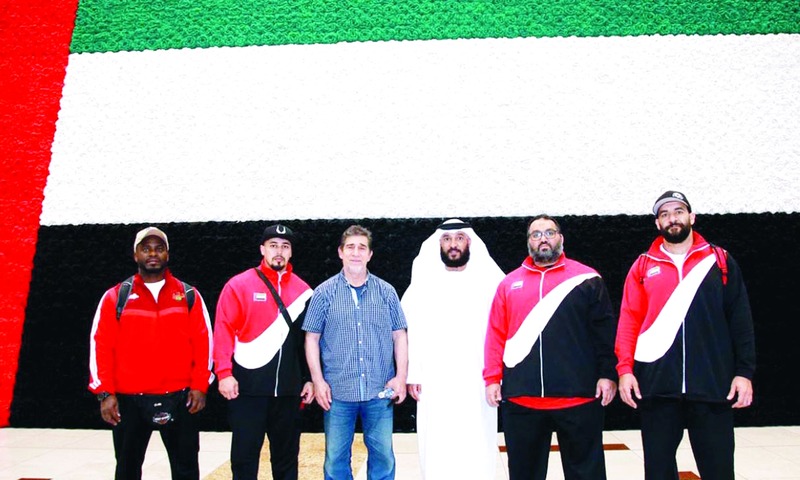 "بن حيدر وبطل العالم يزبك يتوسطان الأبطال | من المصدر"