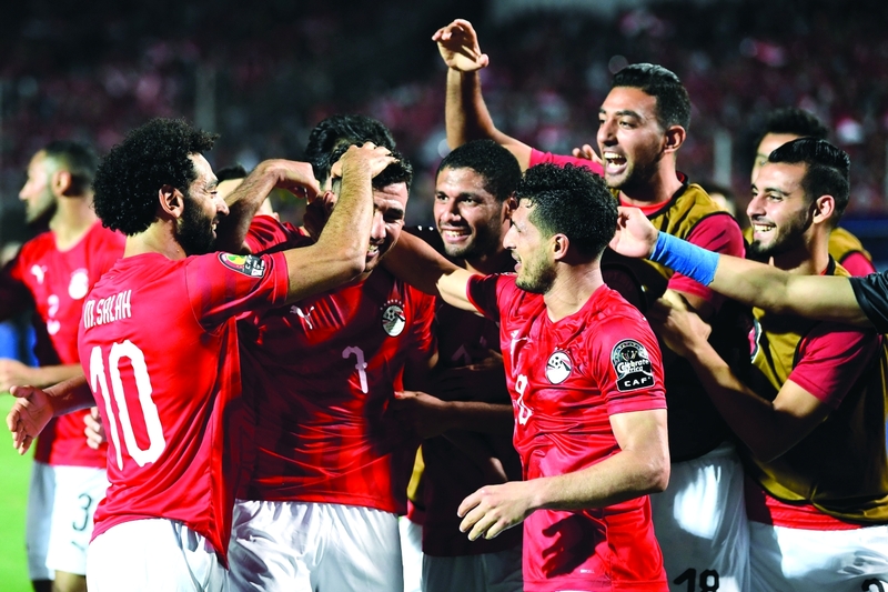 "نجوم المنتخب المصري يحتلفون بهدف «تريزيغيه» | أ ف ب"
