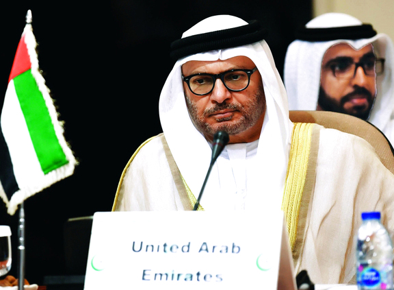 "قرقاش خلال مشاركته في اجتماع جدة | أ.ف.ب"