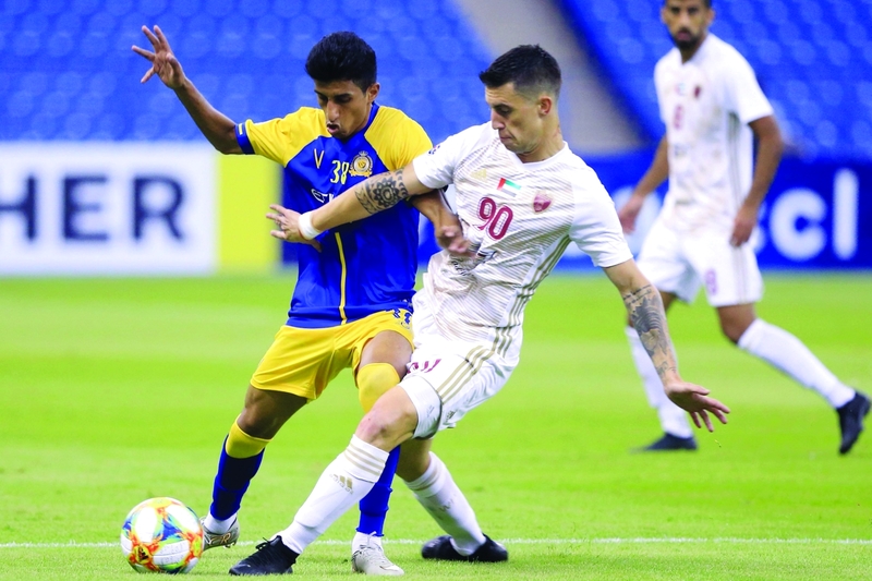 "من لقاء الوحدة والنصر في دوري أبطال آسيا | أ ف ب"