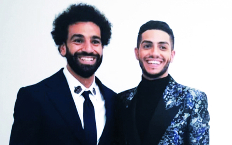 "محمد صلاح مع الفنان مينا مسعود خلال الحفل | البيان"