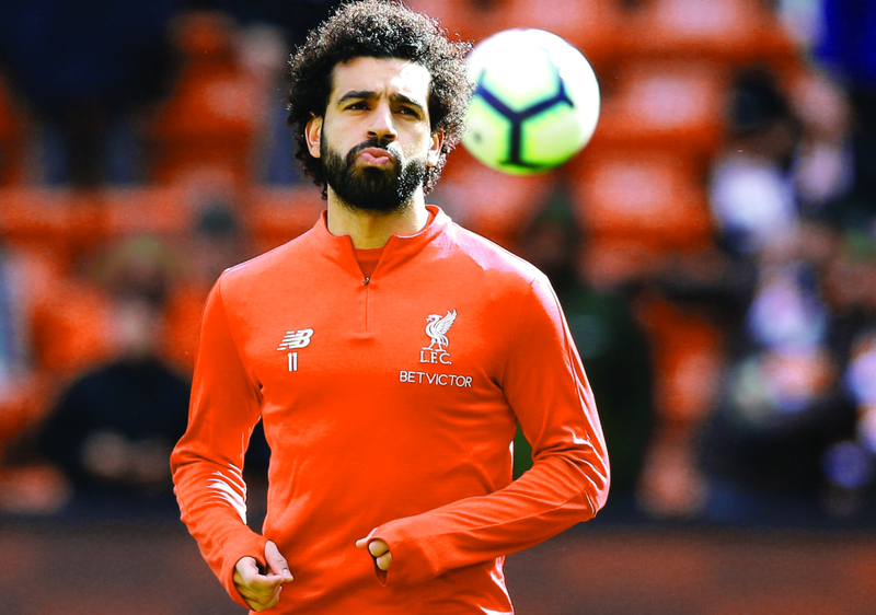"Soccer Football - Premier League - Liverpool v Burnley - Anfield, Liverpool, Britain - March 10, 2019 Liverpool's Mohamed Salah during the warm up before the match REUTERS/Andrew Yates EDITORIAL USE ONLY. No use with unauthorized audio, video, data, fixture lists, club/league logos or «live» services. Online in-match use limited to 75 images, no video emulation. No use in betting, games or single club/league/player publications. Please contact your account representative for further details."
