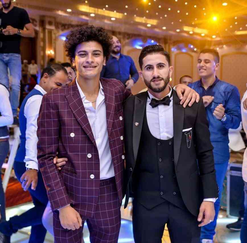 "الزوج أحمد رضا (يمين)"