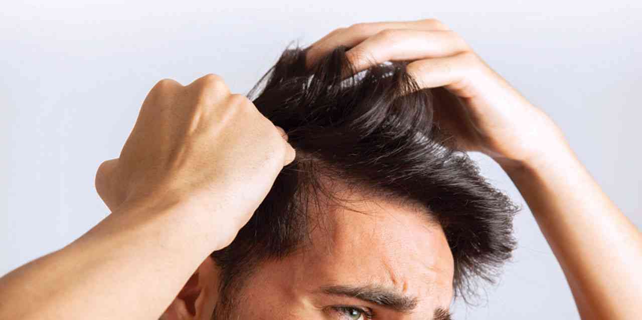 خبراء يحذرون .. كريمات فرد الشعر تسبب السرطان