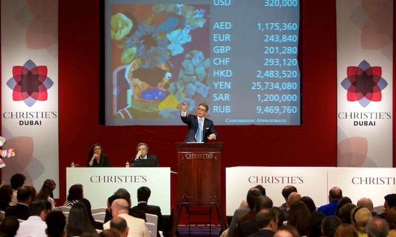 "Auctioneer Oliver Barker calls bids as 11 Picasso paintings and works are auctioned at the Bellagio Hotel in Las Vegas, Nevada, U.S. October 23, 2021. REUTERS/Bridget Bennett"