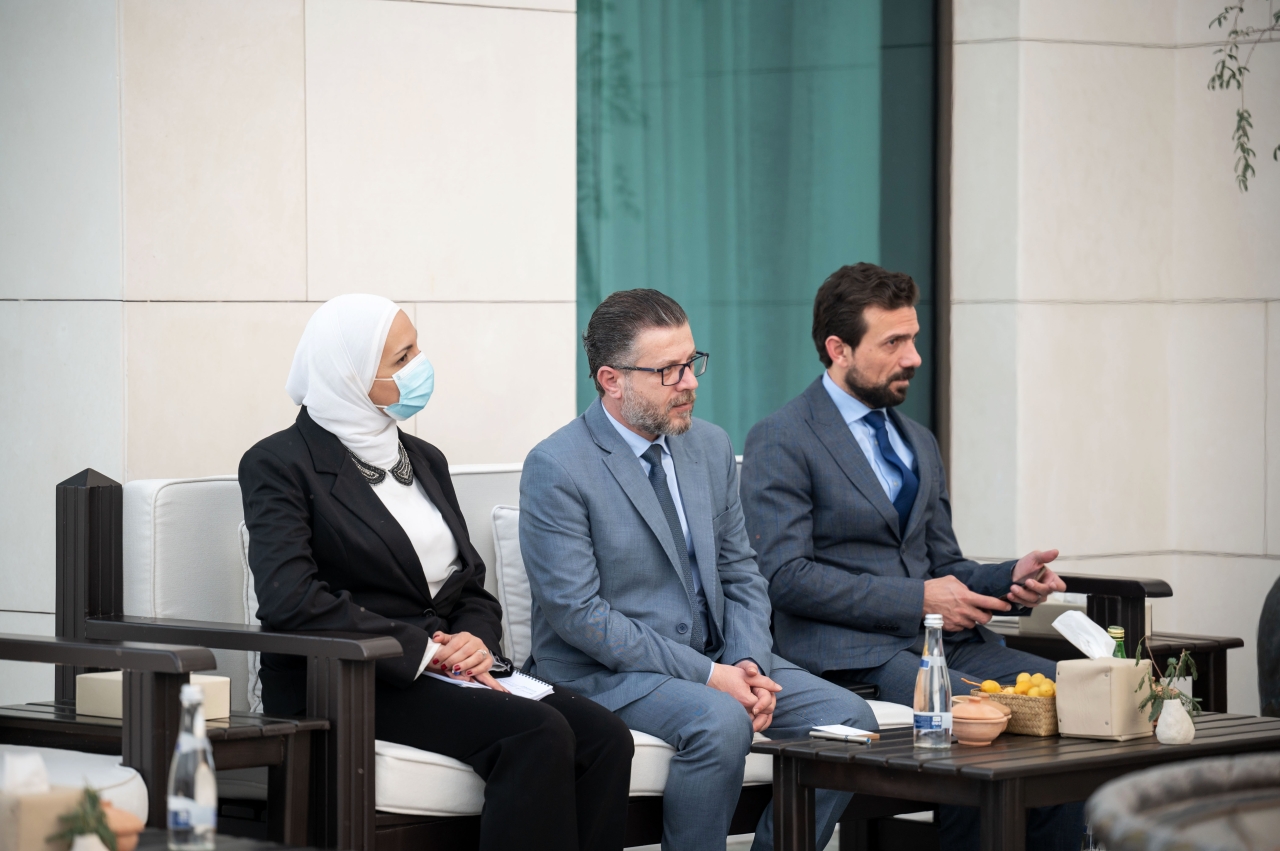 "الوفد السوري خلال اللقاء"