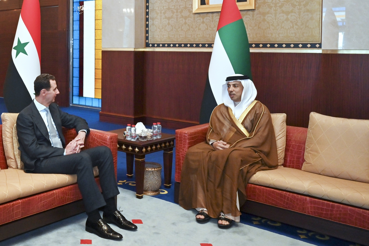 "بشار الأسد ومنصور بن زايد"