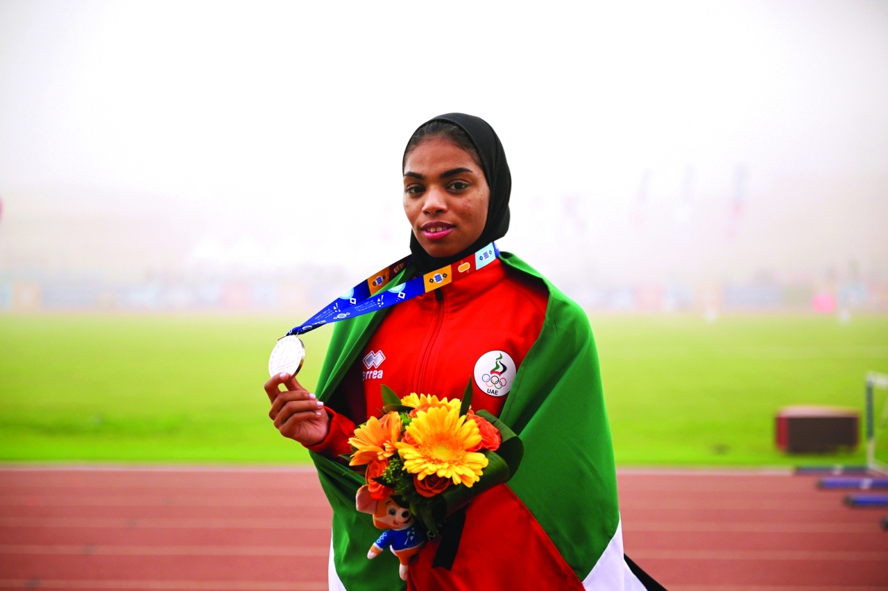 "لطيفة الكعبي نالت فضية الوثب الطويل | تصوير: كامل عبد الله ومحمود سالم"