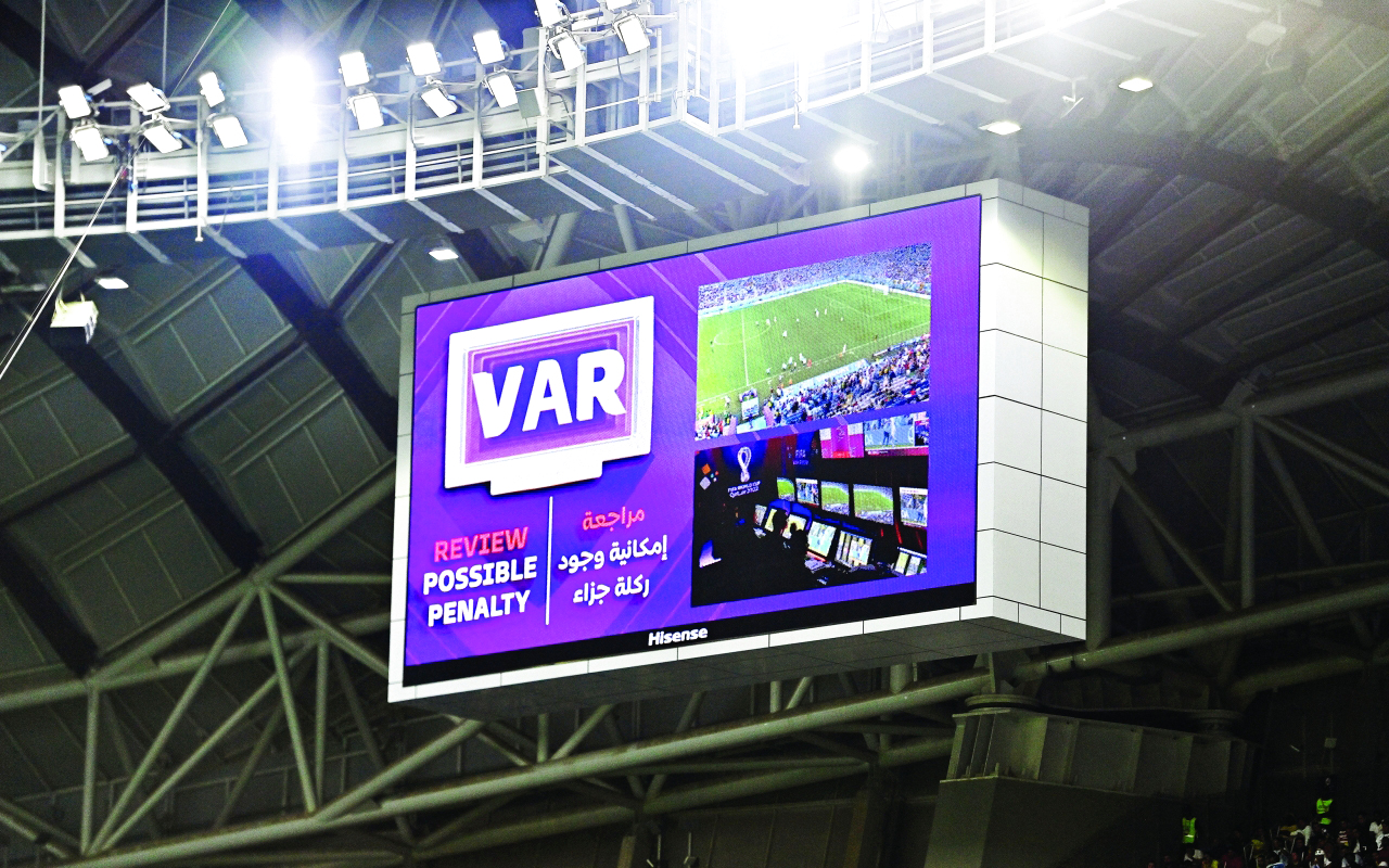 "epa10344482 A penalty decision by the video assistant referee (VAR) system is announced on a huge screen during the FIFA World Cup 2022 group H soccer match between Ghana and Uruguay at Al Janoub Stadium in Al Wakrah, Qatar, 02 December 2022.  EPA/Noushad Thekkayil"