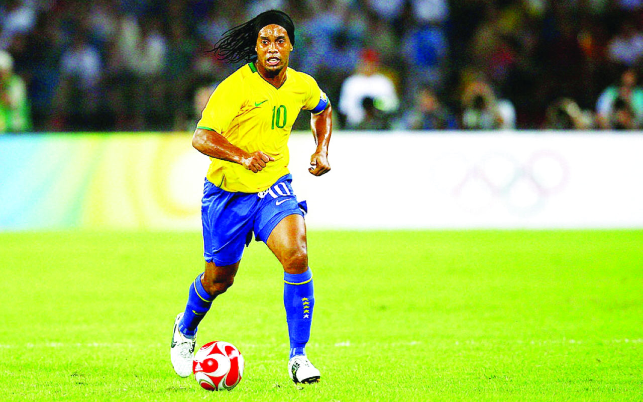 "BEIJING - AUGUST 19: Ronaldinho of Brazil controls the ball during the men's football semifinal match between Argentina and Brazil at Workers' Stadium on Day 11 of the Beijing 2008 Olympic Games on August 19, 2008 in Beijing, China. (Photo by Shaun Botterill/Getty Images)"