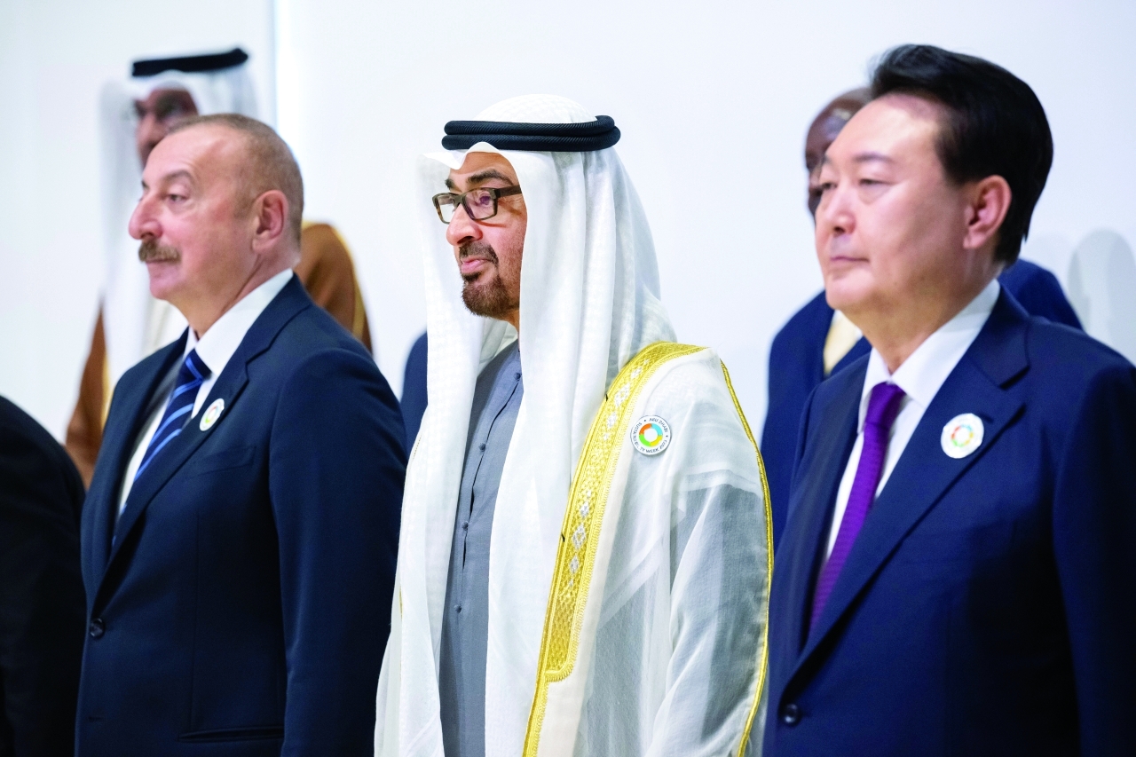 "محمد بن زايد ويون سيوك يول وإلهام علييف"